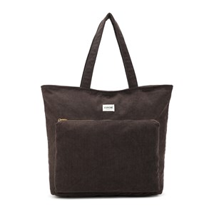 Conmé Shopper Andrea M. Brun