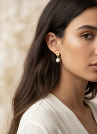 Conmé Örhängen Geneve Guld